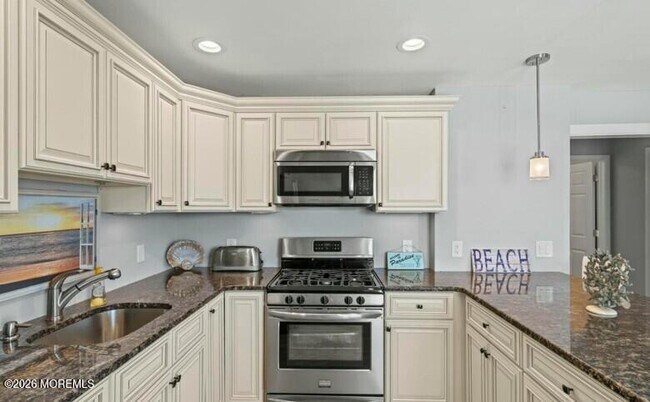 Foto del edificio - 404 Bay Blvd