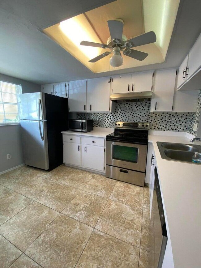 Building Photo - 1702 Palm Beach Trace Dr