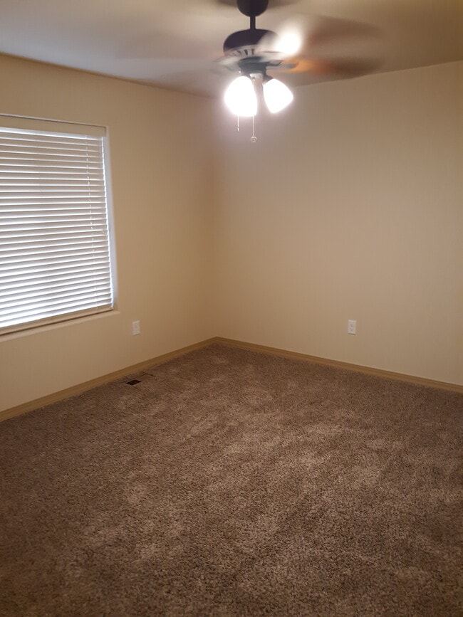 all three bedrooms with carpet and ceiling fans - 2310 Cliffmoor Ln