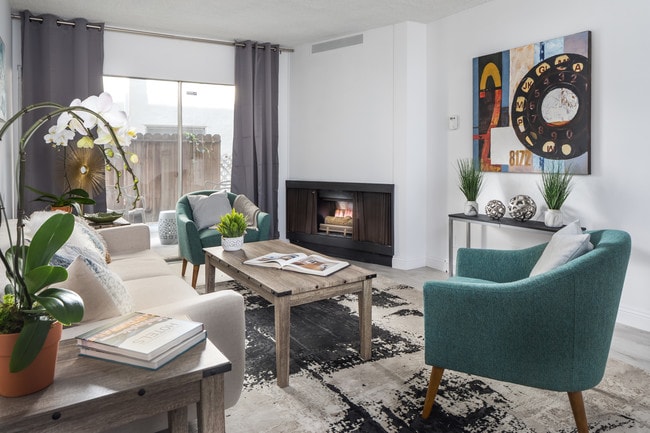 Living Room With Gas Fireplace - ZVI Coast