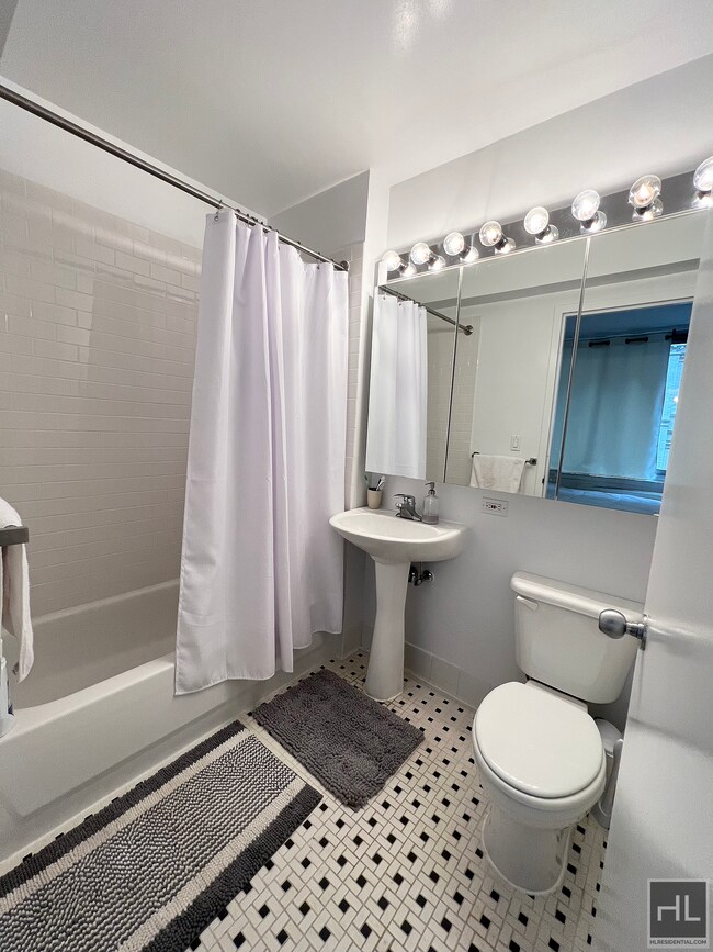 Building Photo - Large Alcove Studio in Luxury Building in ...