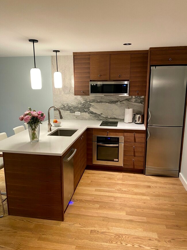 Induction cooktop. - 19 Conselyea St Townhome