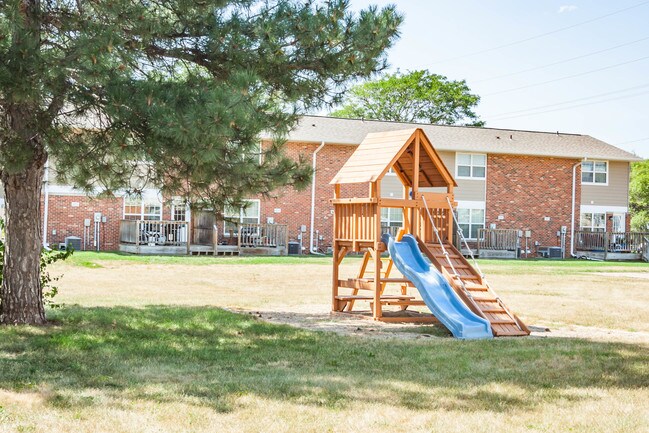 Área de juegos infantiles - Palace Apartments & Townhomes