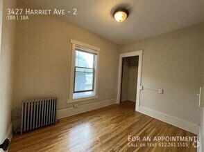 Building Photo - 3427 Harriet Ave