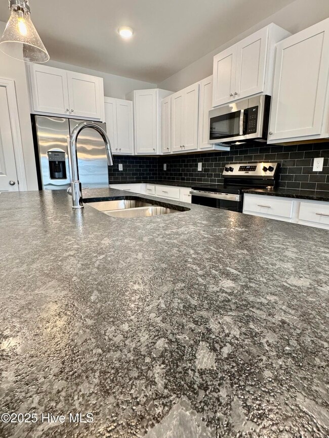 Foto del edificio - 1404 Hartley Ln