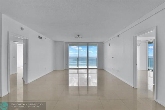 Building Photo - 16699 Collins Ave