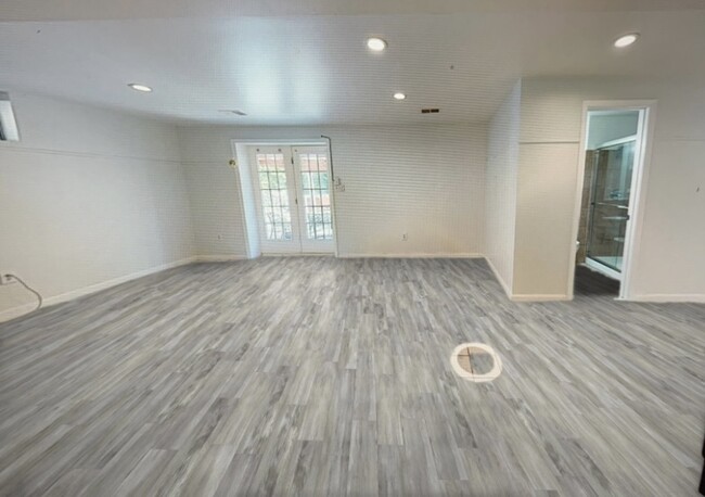 Spacious living room (picture does not show kitchen just built on the left of the bathroom - 14717 Calvary Pl