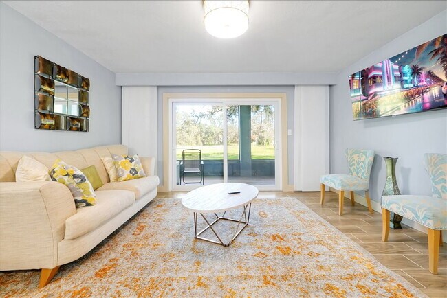 Building Photo - ALL UTILITIES INCLUDED & Fully Furnished! Sleek 2BR/2BA Townhome in Haines City