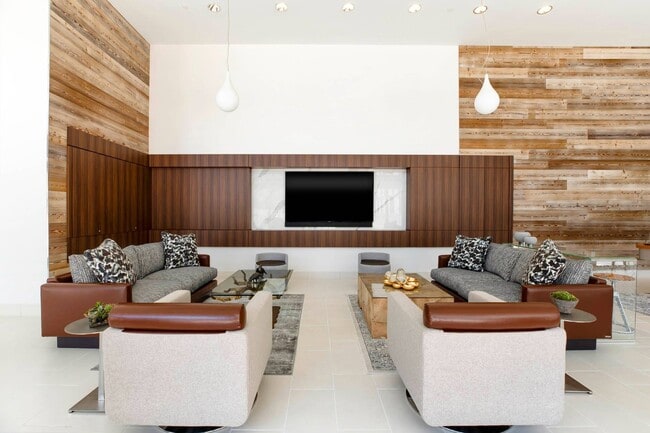 Comfortable lounge with TV and modern décor. - The Apartments at CityCenter