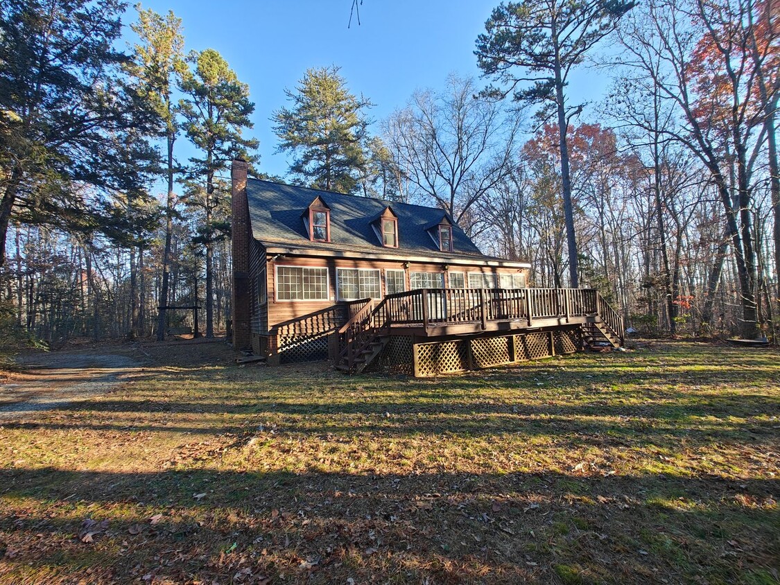 Primary Photo - # bedroom home nestled in the woods