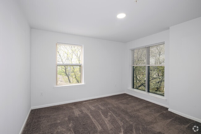 2BR, 1BA - 982SF - Primary Bedroom - City Views Apartments