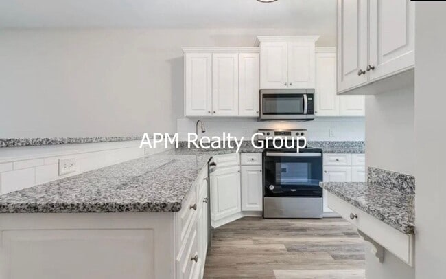 Building Photo - Easly Living Townhome