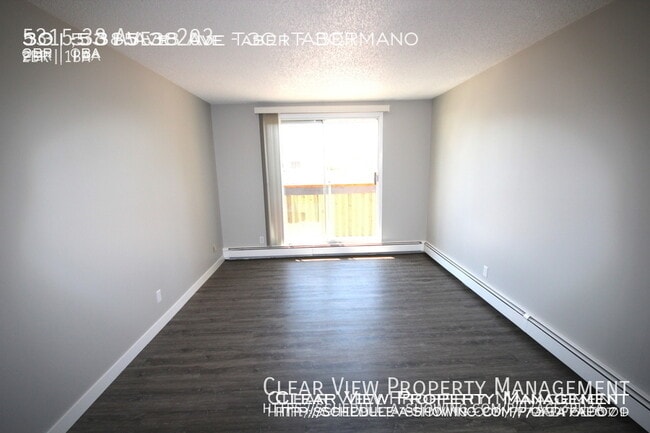 Building Photo - ? Beautifully Renovated 2-Bedroom Suite in Taber Manor!??Showings available at (647) 901-0141??