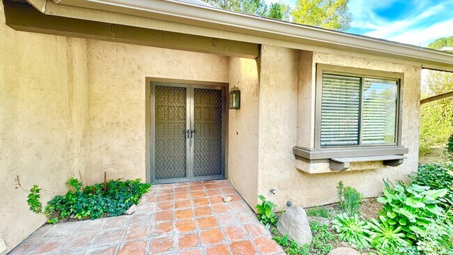 Building Photo - Sweet Walk-up, Ground Level Condo Unit in ...