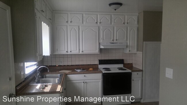 Foto del edificio - 2 br, 1 bath House - 409 N Rogers