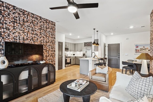 Living Room with Views to the Kitchen and Dining Area. - Cendana Craig Ranch