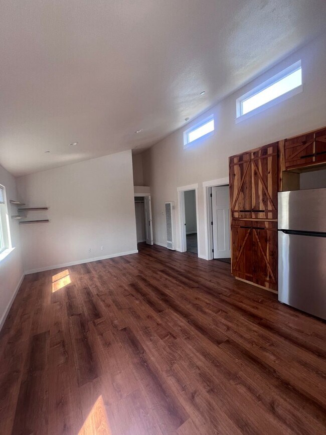 Building Photo - 2 Bedroom 1 bath house with extra large double car garage and extra storage space!