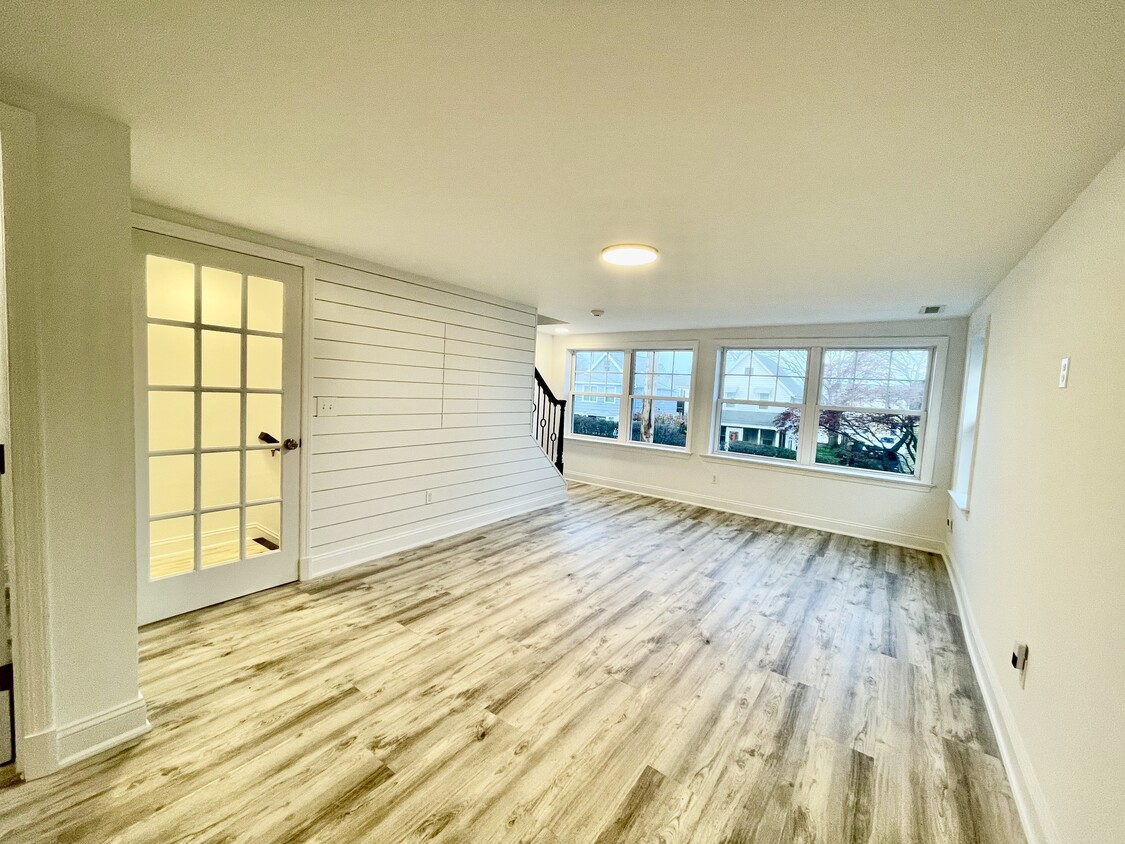 Massive living area with ample natural light and town/water views - 90 Naugatuck Ave