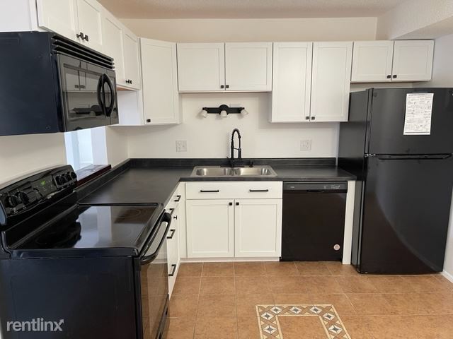 Building Photo - 2 br, 1 bath Condo - 1120 E 6th St 8 Unit 8