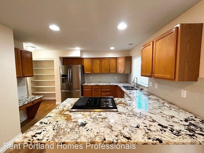 Building Photo - 4 br, 2.5 bath House - 10944 NW Barrett Way