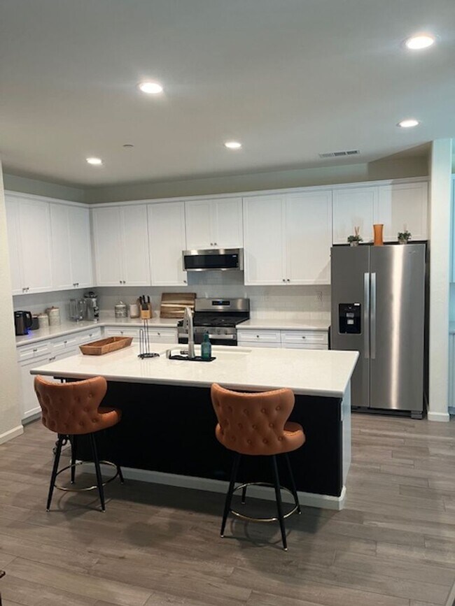 Building Photo - **Stunning Nearly New 4-Bedroom Home with ...