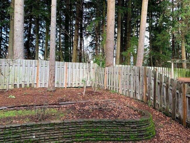 raised flower bed - 5671 NE Canard Dr