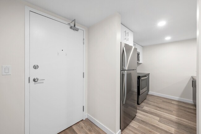 Photo du bâtiment - 1-Bedroom Apartment