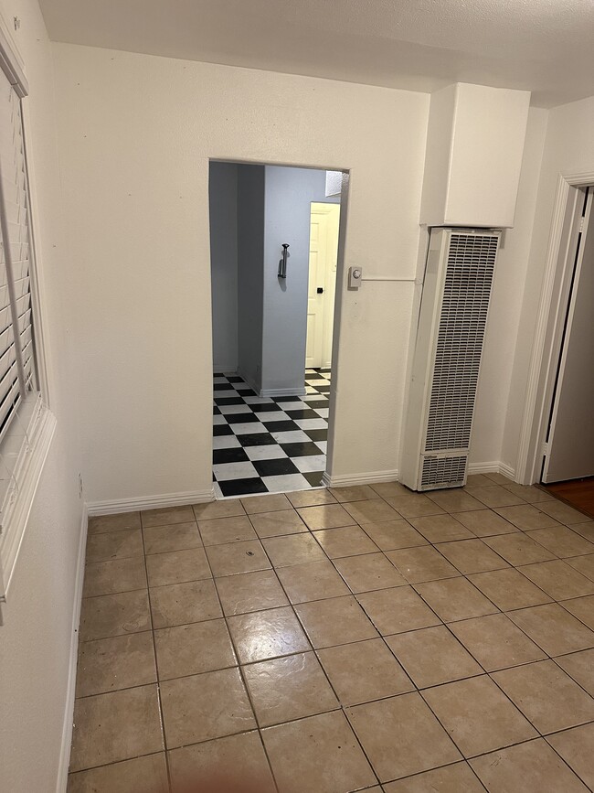 Living room into leading into the kitchen - 246 W 16th St