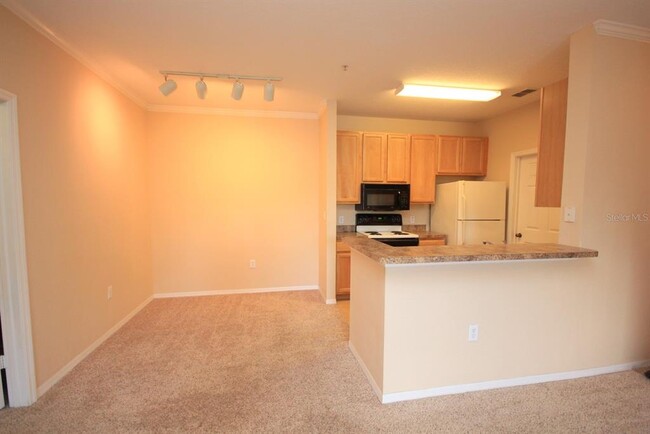Building Photo - 10203 Courtney Palms Blvd