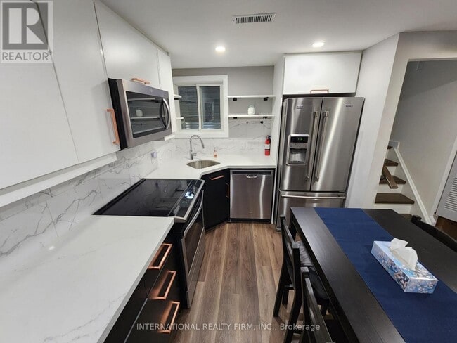 Photo du bâtiment - 435 Hansen Rd N