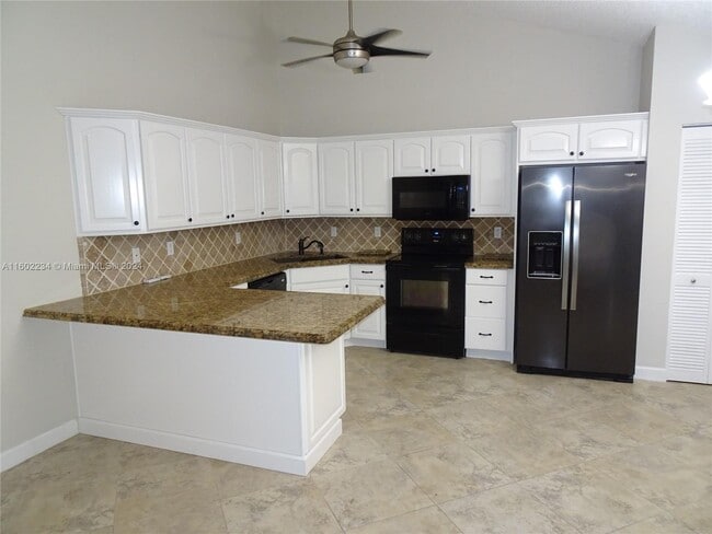 Building Photo - 9732 Boca Gardens Cir N