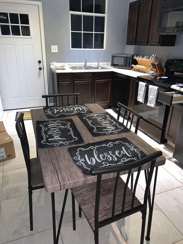 Kitchen and dining room - 11811 Old Fort Rd
