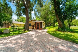 Building Photo - 5709 Lake Le Clare Rd