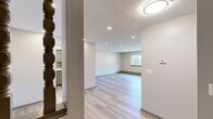 This single-floor, one-bedroom, one-bathroom unit in Middletown, CT offers a thoughtfully updated interior with a cohesive, neutral aesthetic throughout. Light-toned hardwood-style flooring runs through the living areas, complemented by textured ceilings and recessed lighting that brightens the space efficiently.

The living room is generously proportioned, with recessed lights overhead, baseboard heating, and a window that draws in natural light. The layout connects seamlessly to the kitchen, which stands out as a highlight of the unit. It features raised-panel gray cabinetry, granite countertops, a mosaic tile backsplash, an undermount sink, and stainless steel appliances including a dishwasher, electric range, and range hood.

The spacious primary bedroom includes a window with exterior views, a closet with sliding doors, and durable gray-toned hardwood-style flooring. The bathroom is clean and functional, featuring a full tub-shower combination with tiled surround, a toilet, and tile flooring.

Throughout the unit, a neutral color palette, updated fixtures, and baseboard heating systems create a practical and modern living environment suitable for everyday comfort.