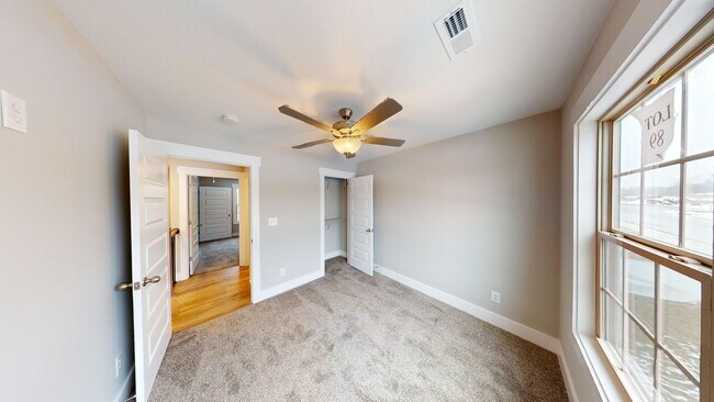 Building Photo - Beautifully Upgraded Home | Stone Fireplace, Open Kitchen and Two-Car Garage