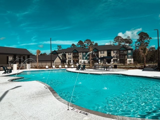 Resort style beach entry pool - Odyssey at Mallette Gardens