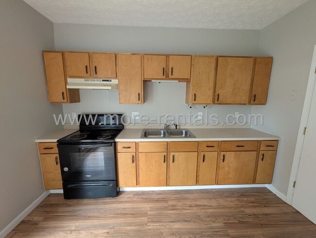Building Photo - Remodeled home with fenced yard and large deck