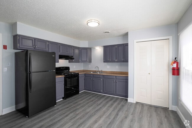 3BR, 1.5BA - 1,129SF - Kitchen - Charles Drew Court Apartments