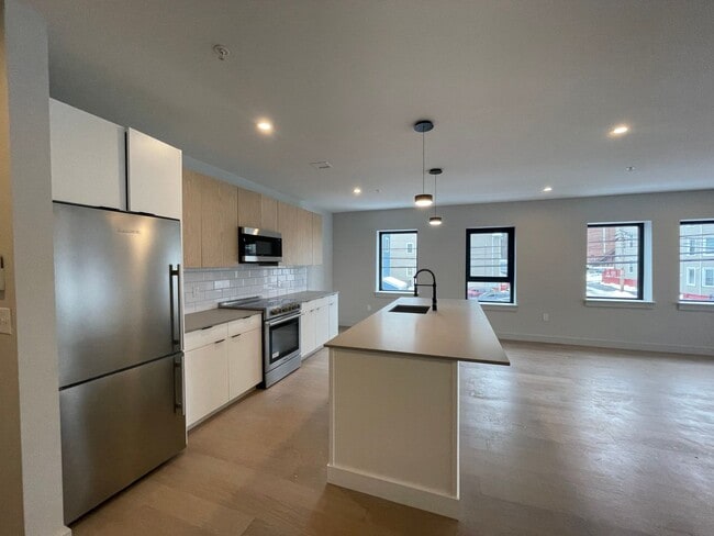 Foto del edificio - New construction condo available now!