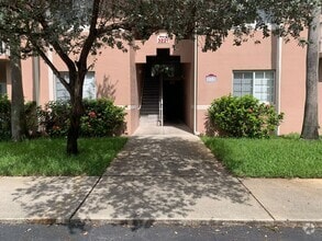 Building Photo - 3221 Sabal Palm Manor