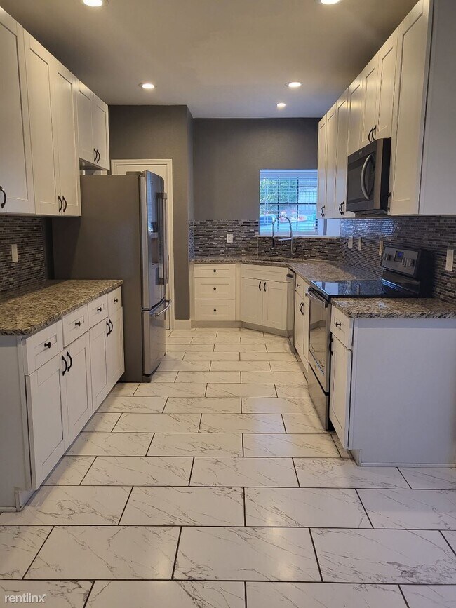 Foto del edificio - 4 br, 2.5 bath House - 9302 Laurel Grove
