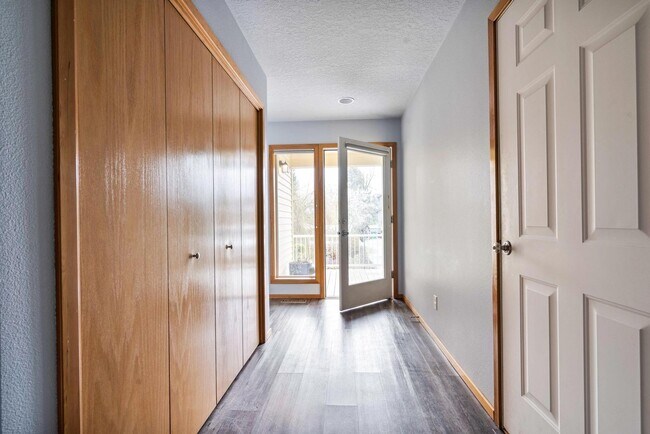 Building Photo - Forested, updated 3-bdr/2-bath contemporar...