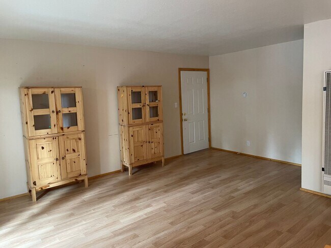Building Photo - Upstairs Condo - 2 Bedroom, 1 Bath with Ca...