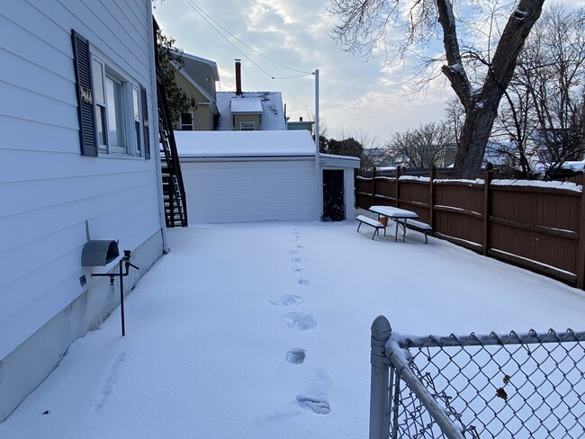 Back yard w/ shed & picnic table - 136 Hall St