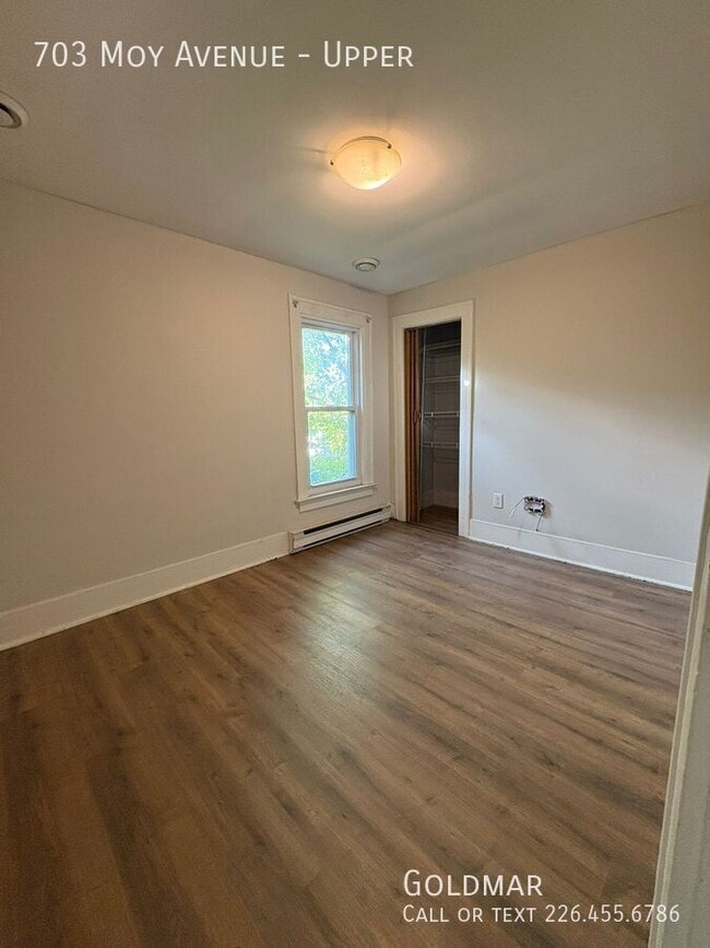 Photo du bâtiment - NEW LISTING