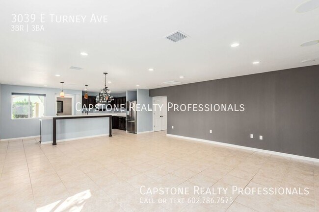 Building Photo - Beautiful 3 bedroom plus den, server area,...