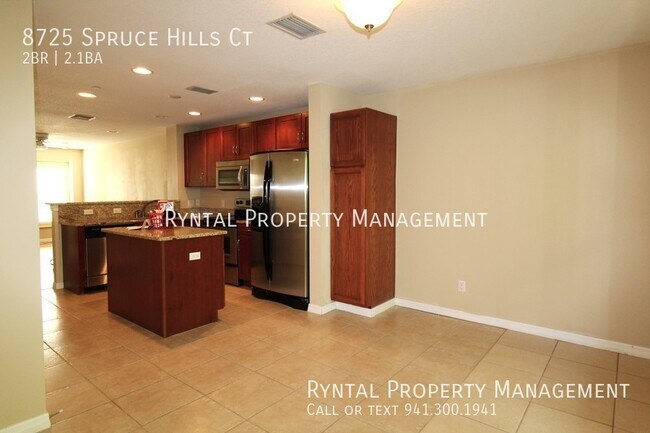 Foto del edificio - 8725 Spruce Hills Ct