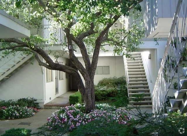 Building Photo - The Pines Apartments
