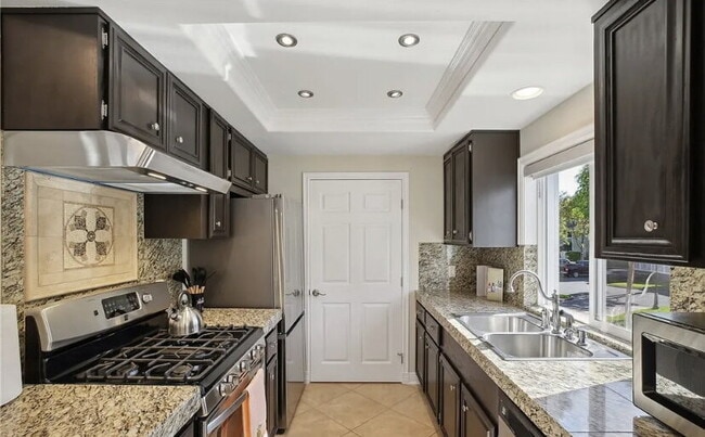 Building Photo - Nestled within the highly sought-after Hea...