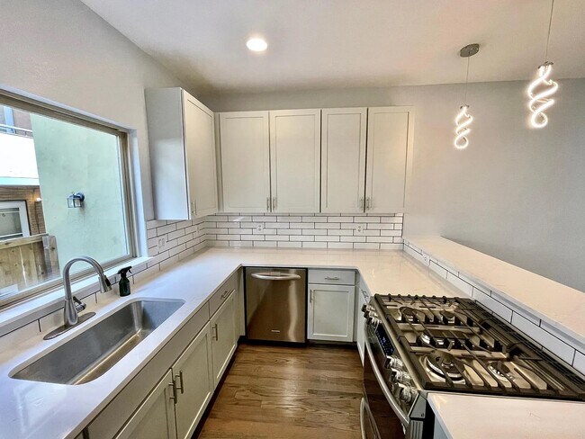 Kitchen with brand new stove - 1874 Vine St
